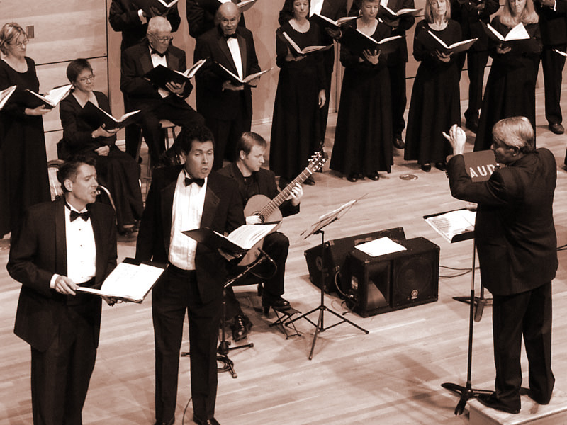 Michael Quam, choir
                    and guitar